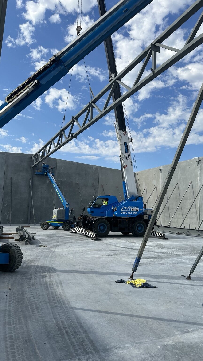 West Coast Crane Hire 16 tonne Tadano city crane completing a steel lift